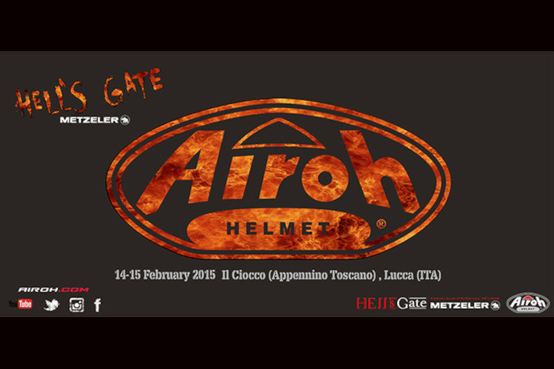 Plakat promujący HELL’S GATE METZELER 2015 z logiem Airoh na środku, całość w odcieniu czarno-pomarańczowym