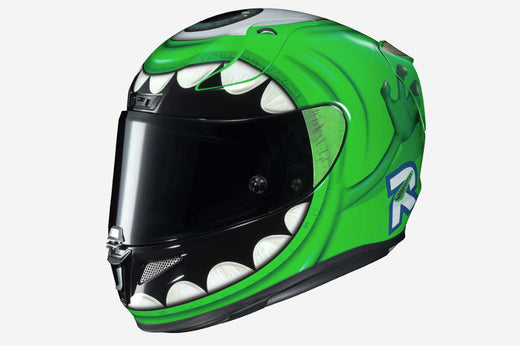 kask HJC RPHA 11 w malowaniu mike wazowski z filmu potwory i spółka, w zielonym kolorze, prezentowany na białym tle